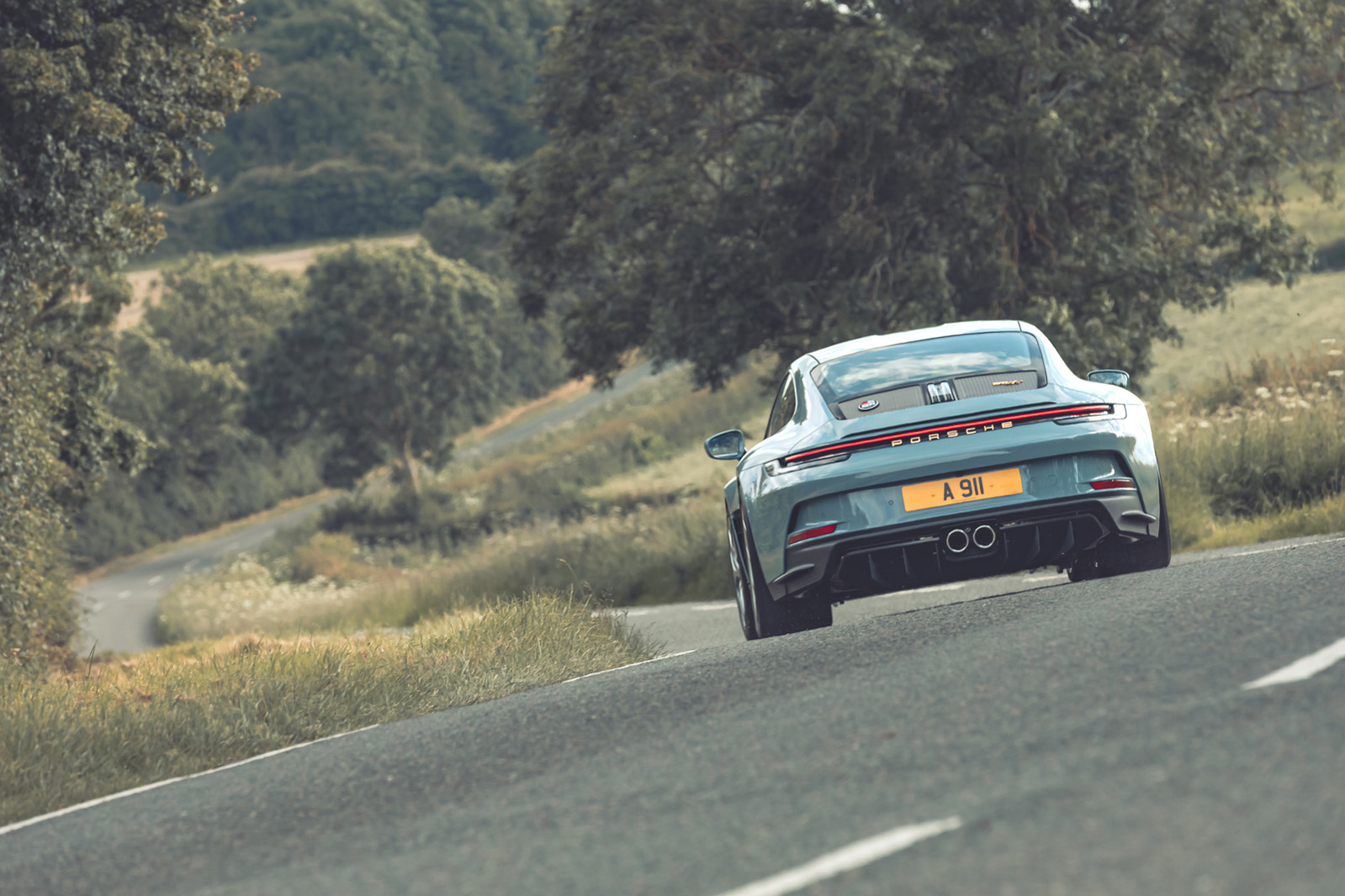 3 Porsche 911 S:T 2024 cornering rear