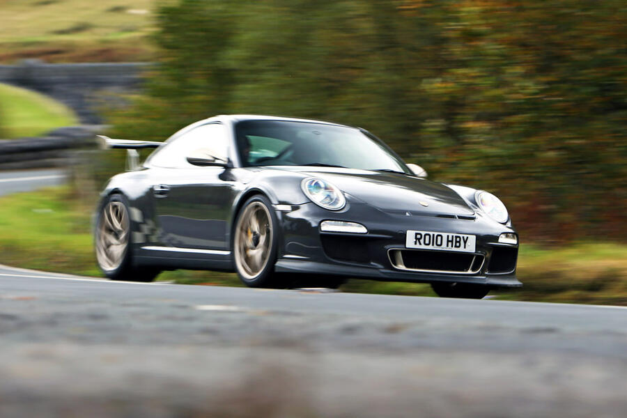 4 Porsche 911 gt3 rs 997 gen 2 tracking side