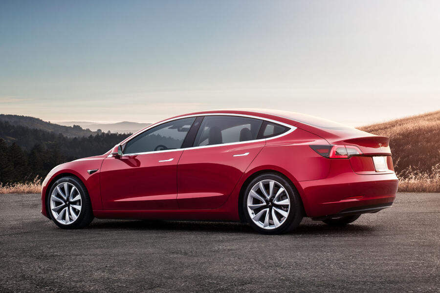 Model 3   red rear sunset