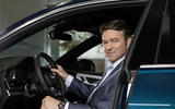 Audi CEO Bram Schott press shot 