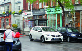 Toyota Auris driving on high street