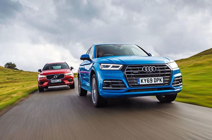 Audi Q5 leading Volvo XC60 