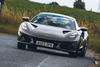 lotus emira 4 cylinder 2023 review 01 cornering front richard lane